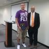 Cabell County Schools Superintendent William Smith presented an award to Huntington High student Tevin Thomas for taking the initiative to request an African-American history course throughout the entire school year.