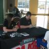 Michael Veazey, manager of the 16th Street Papa John's in Huntington and Keri Sewell, a manager in Ashland, Ky.,  interview a B4 student. 