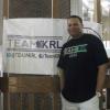 TEAM KRL poses with banner.