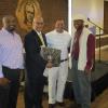 TEAM KRL'S Shannon King, Chris Layne and Duane Rankin awarded William Smith, center, a plaque and Rose Bowl cooler as the retiring Cabell County Public Schools' superintendent was the featured speaker at the 2017 B4 program. 